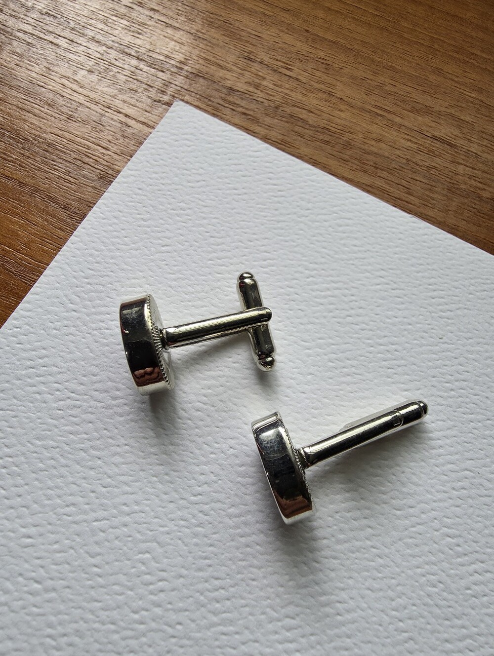 Classic silver-tone metal cufflinks featuring a polished oval face - Picture 2 of 6